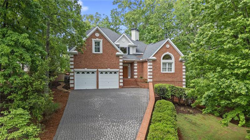 Image for property 7830 Kings Point Drive, Cumming, GA 30041