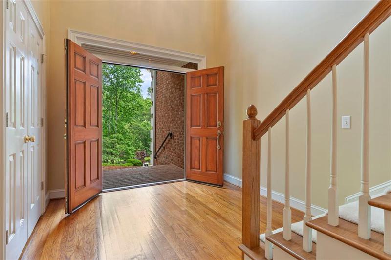 Image for property 7830 Kings Point Drive, Cumming, GA 30041