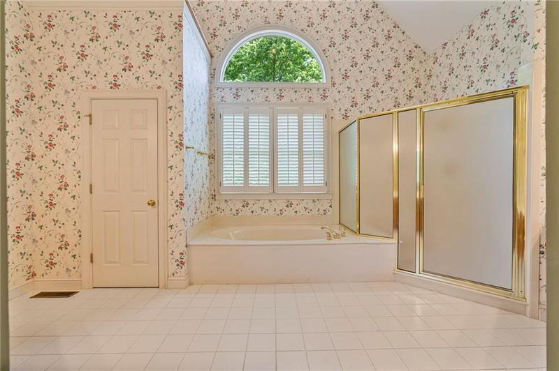 Image for property 7830 Kings Point Drive, Cumming, GA 30041