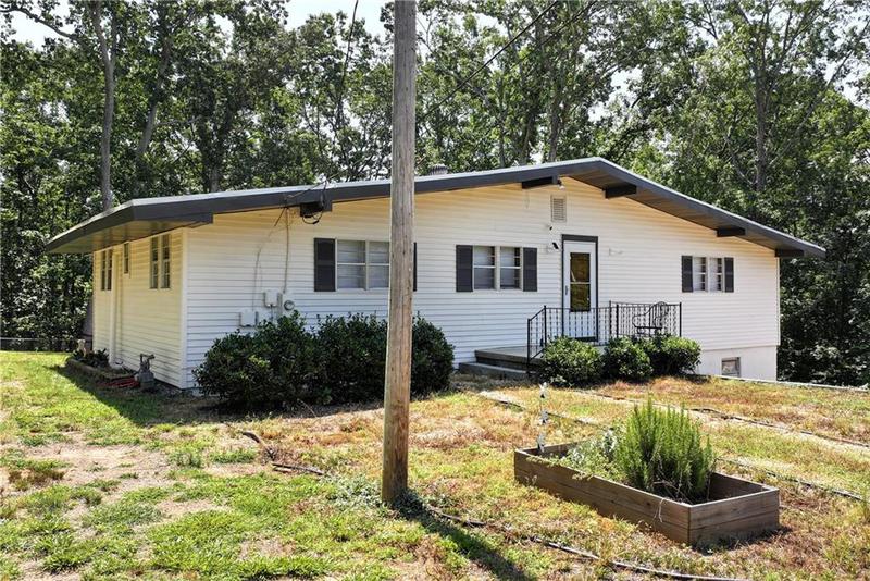 Image for property 5981 Warpath Road, Flowery Branch, GA 30542