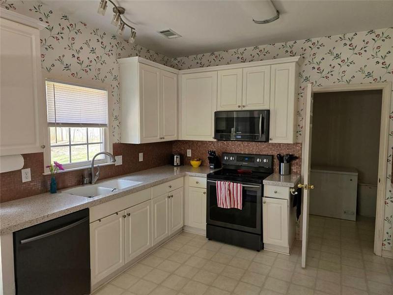 Image for property 275 ROSE IVY Court, Lawrenceville, GA 30043