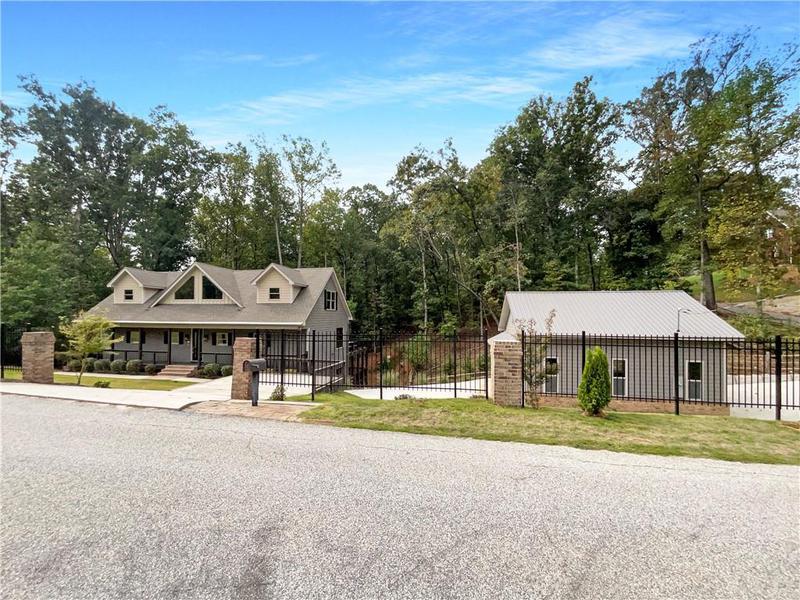 Image for property 5972 Warpath Road, Flowery Branch, GA 30542