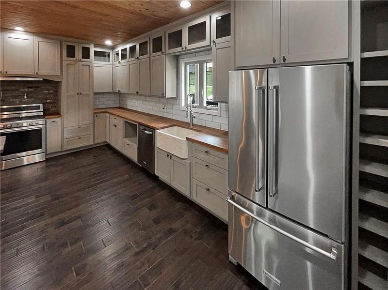 Image for property 5972 Warpath Road, Flowery Branch, GA 30542
