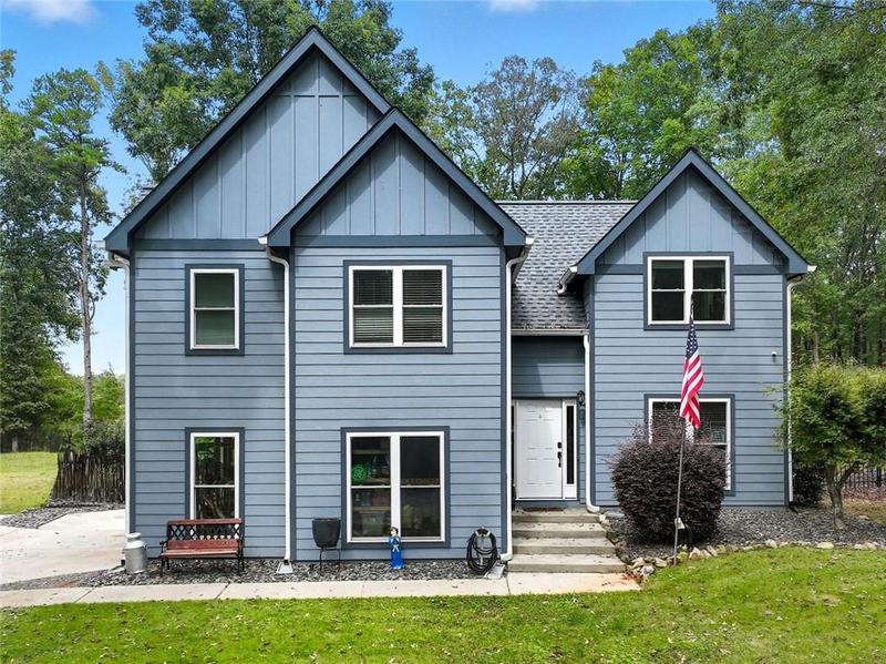 Image for property 95 Tyler Woods Drive, Sharpsburg, GA 30277