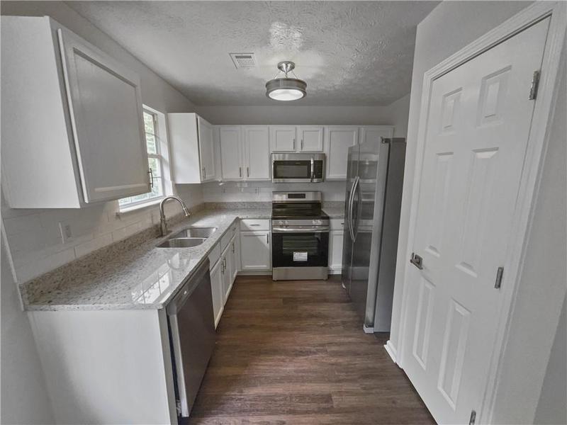 Image for property 5789 Wellborn Creek Drive, Lithonia, GA 30058