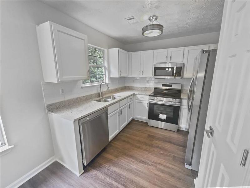 Image for property 5789 Wellborn Creek Drive, Lithonia, GA 30058
