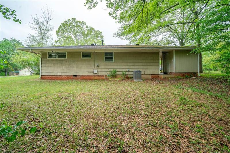 Image for property 5253 Kingswood Circle, Atlanta, GA 30349