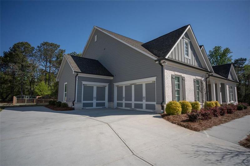 Image for property 6165 NAMON WALLACE Drive, Cumming, GA 30028