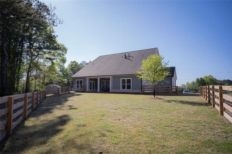 Image for property 6165 NAMON WALLACE Drive, Cumming, GA 30028