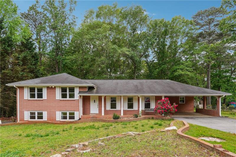 Image for property 851 Rockbridge Road, Lilburn, GA 30047