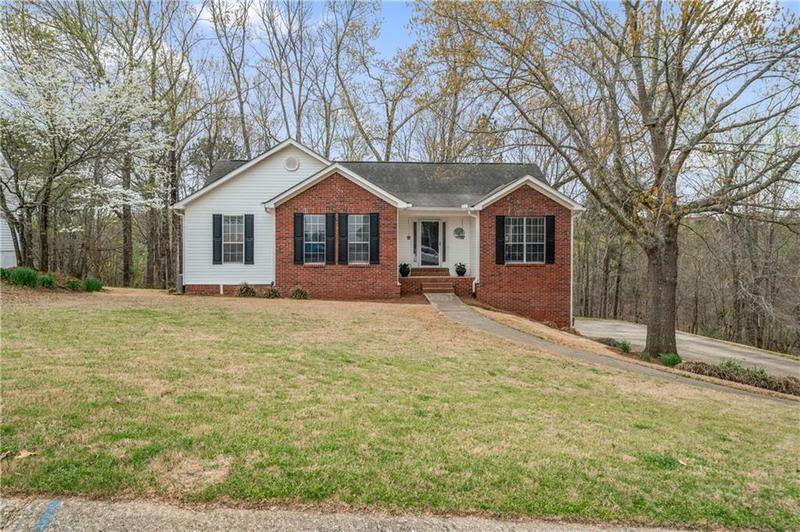 Image for property 5550 Chestnut Creek Lane, Flowery Branch, GA 30542