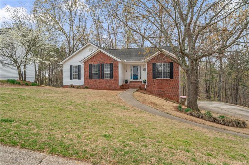 Image for property 5550 Chestnut Creek Lane, Flowery Branch, GA 30542