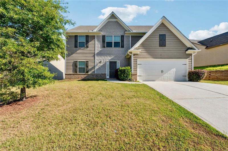 Image for property 7431 Saint David Street, Fairburn, GA 30213