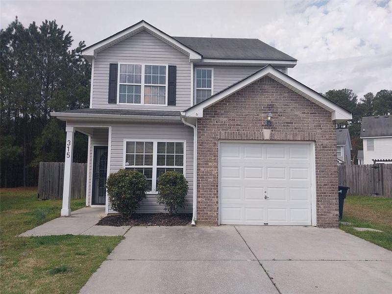 Image for property 315 DRESSAGE Court, Riverdale, GA 30296