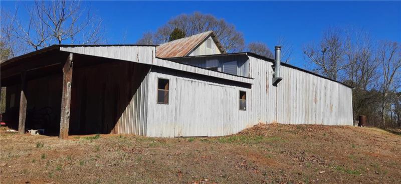 Image for property 11953 Henderson Mountain Road, Fairmount, GA 30139