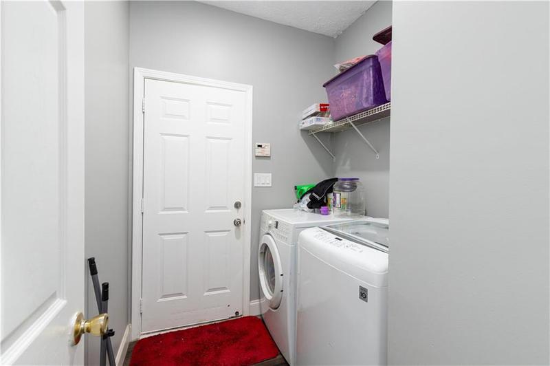 Image for property 2221 BAKER CARTER Drive, Loganville, GA 30052