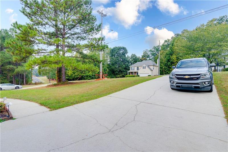 Image for property 2221 BAKER CARTER Drive, Loganville, GA 30052
