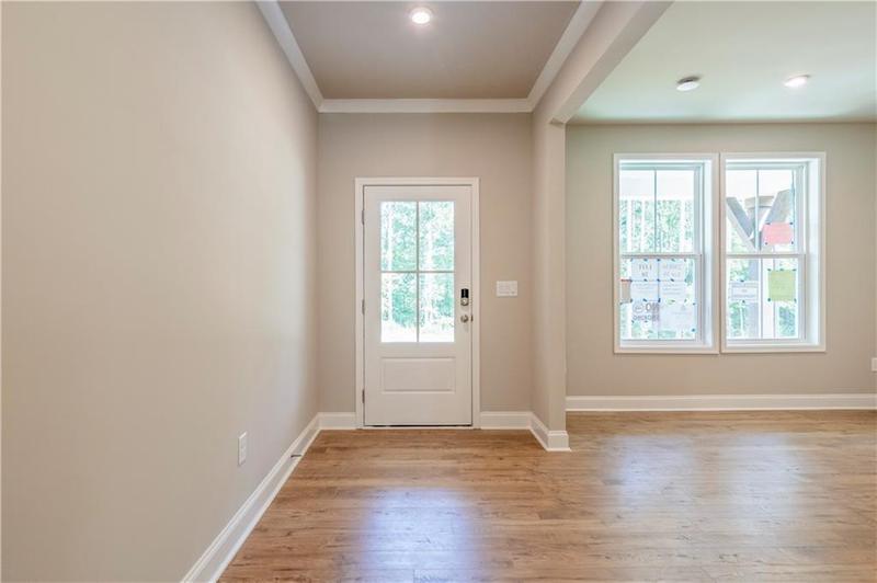 Image for property 7620 Woolf Way, Cumming, GA 30028