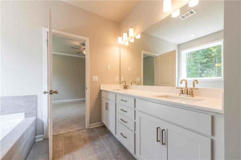 Image for property 7620 Woolf Way, Cumming, GA 30028