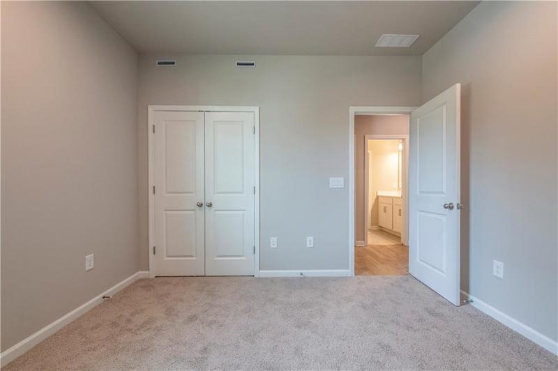 Image for property 7620 Woolf Way, Cumming, GA 30028