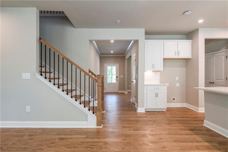 Image for property 7620 Woolf Way, Cumming, GA 30028