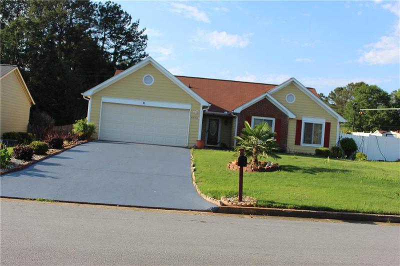 Image for property 5574 McCrossin Circle, Lithonia, GA 30038