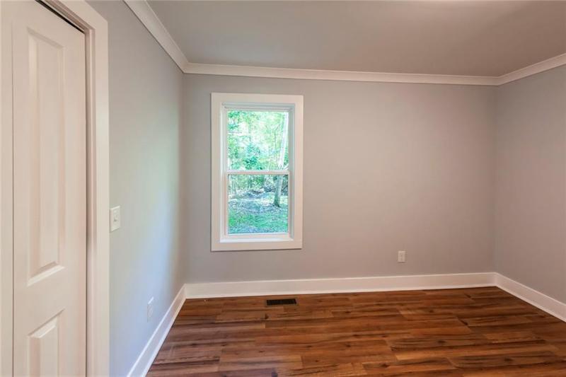 Image for property 140 Walker Woods Drive, Carrollton, GA 30116