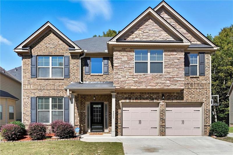 Image for property 4227 Meadow Wind Drive, Snellville, GA 30039