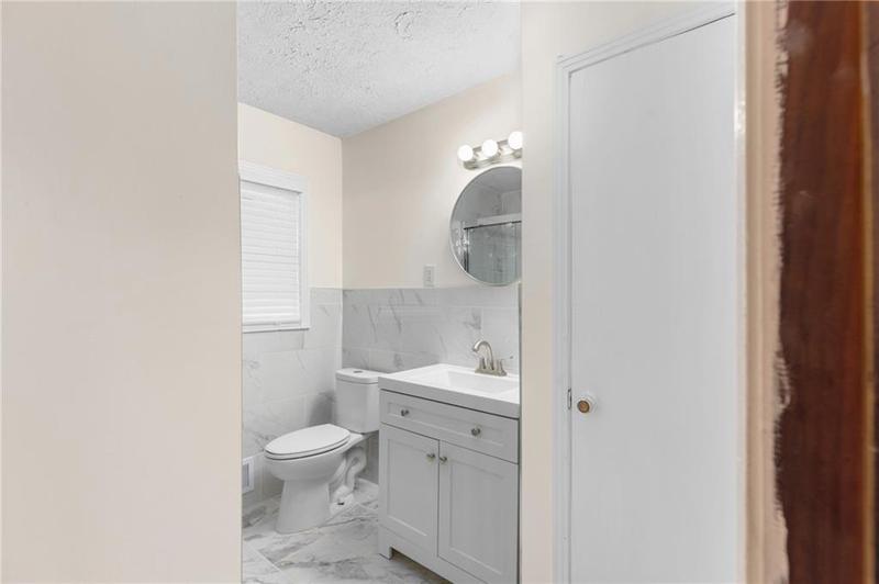 Image for property 4440 Stonewall Tell Road, Atlanta, GA 30349