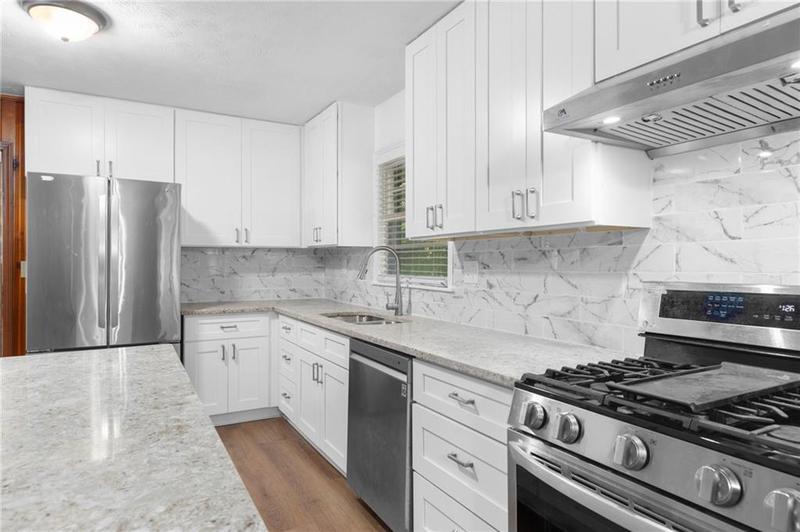 Image for property 4440 Stonewall Tell Road, Atlanta, GA 30349