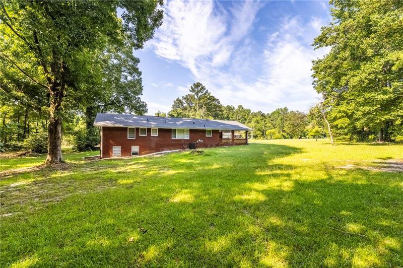 Image for property 4440 Stonewall Tell Road, Atlanta, GA 30349
