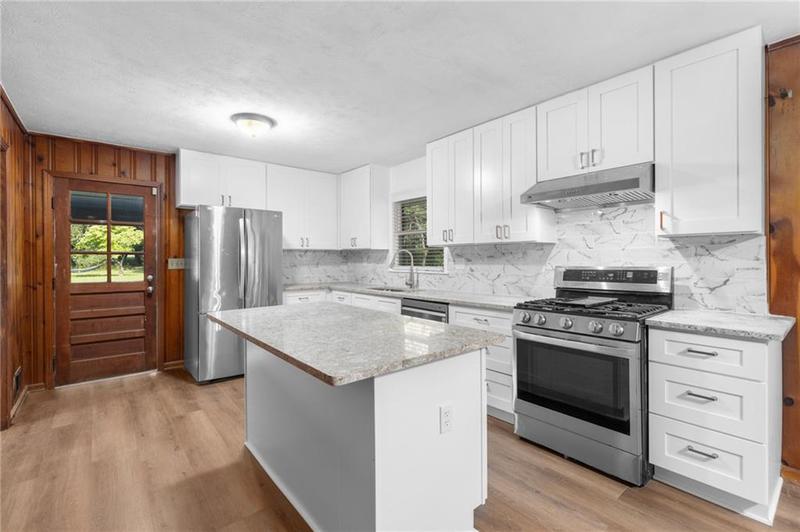 Image for property 4440 Stonewall Tell Road, Atlanta, GA 30349