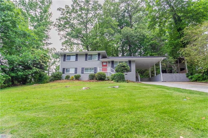 Image for property 5795 Deerfield Trail, Atlanta, GA 30349
