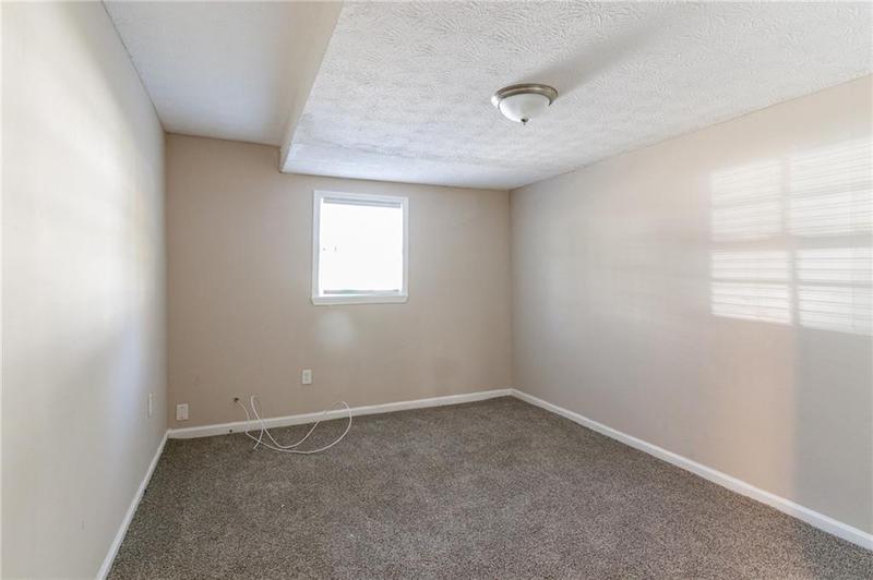 Image for property 5382 Kemper Place, Stone Mountain, GA 30088
