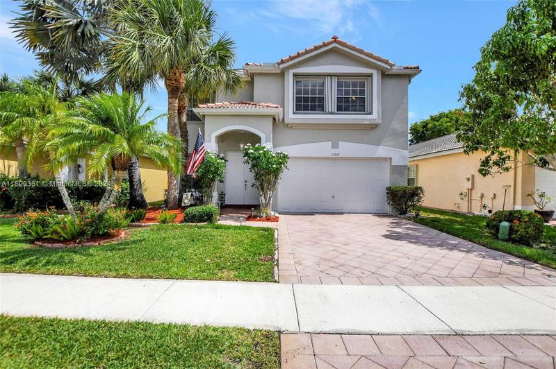Image for property 12327 53rd St, Coral Springs, FL 33076