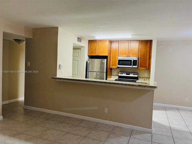 Image for property 10521 157th Pl 106, Miami, FL 33196