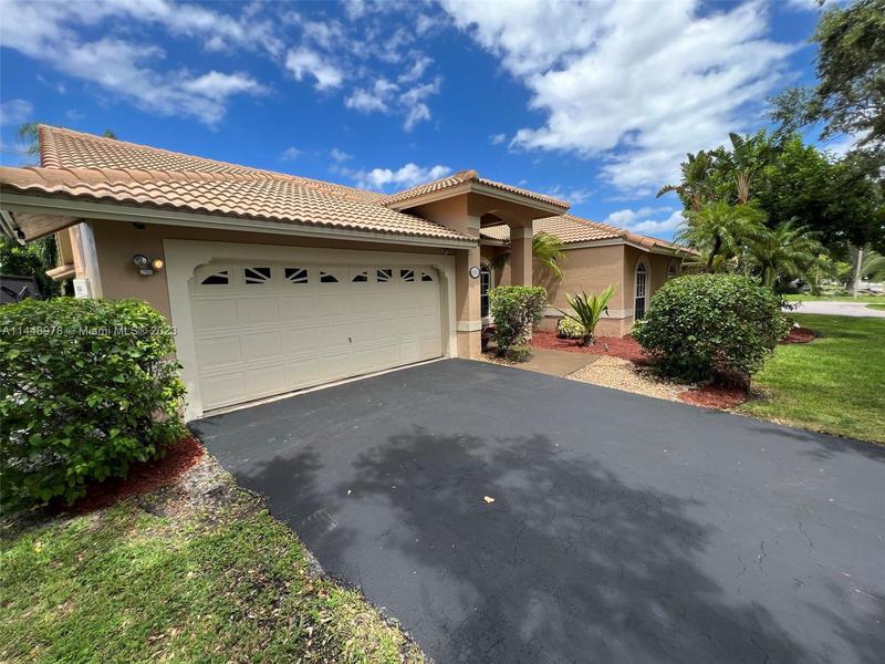 Image for property 10025 47th St, Coral Springs, FL 33076